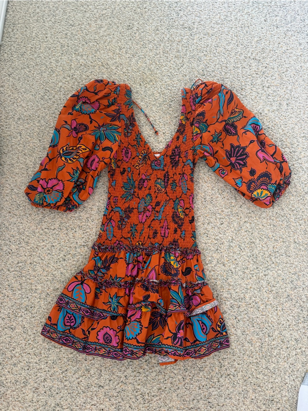 Vibrant Orange Floral Smocked Jumpsuit
